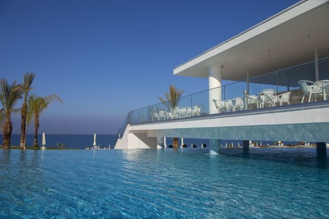 Indoor pool, outdoor pool, pool umbrellas, sun loungers