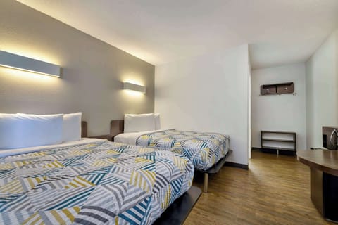 Premium bedding, pillowtop beds, minibar, individually decorated