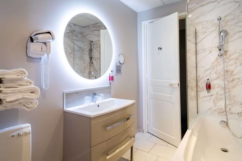 Hair dryer, towels, soap, shampoo