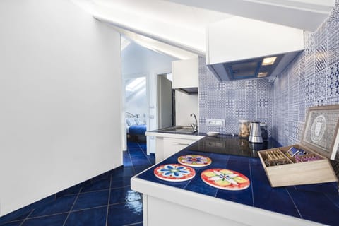 Design Apartment | Private kitchen | Full-size fridge, microwave, oven, stovetop