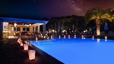 Seasonal outdoor pool, open 9:00 AM to 8:00 PM, free cabanas