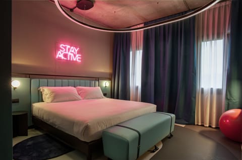 Premium bedding, down comforters, pillowtop beds, minibar