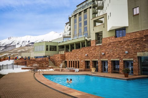 Indoor pool, outdoor pool, pool umbrellas