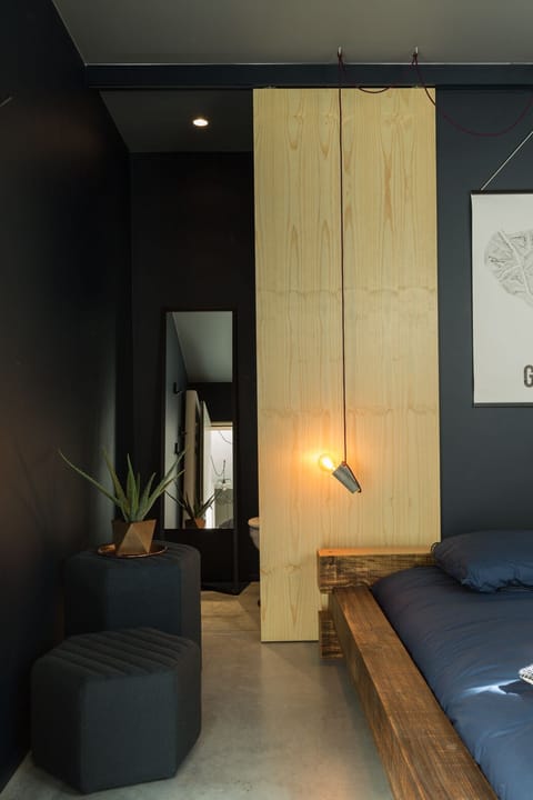 Design Room, 1 Queen Bed, Private Bathroom, Courtyard View | Individually decorated, individually furnished, blackout drapes