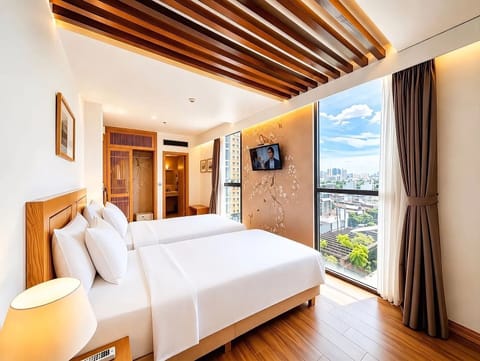 Deluxe Twin Room | 1 bedroom, minibar, in-room safe, desk