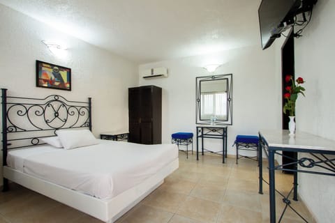 Desk, laptop workspace, free WiFi, bed sheets