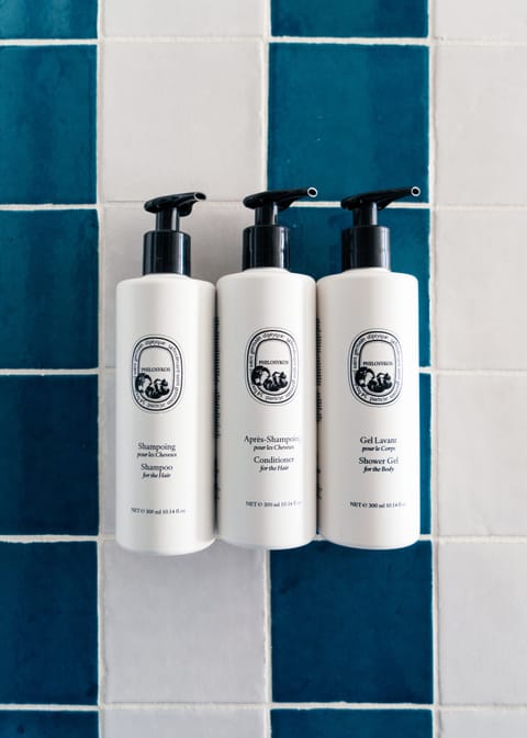 Rainfall showerhead, designer toiletries, hair dryer, bathrobes