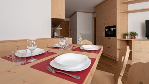 Apartment (1 Bedroom) | Living area | 55-inch flat-screen TV with cable channels, TV