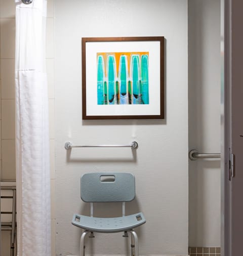 Designer toiletries, hair dryer, towels