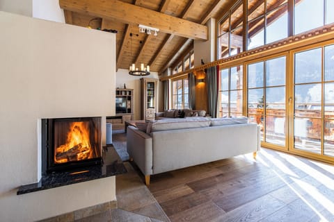 Eight-Bedroom Chalet | Living area | Heated floors