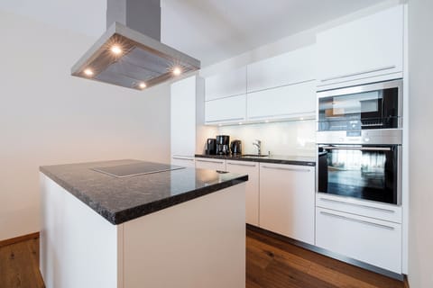 Apartment | Private kitchen | Espresso maker, coffee/tea maker, highchair, dining tables