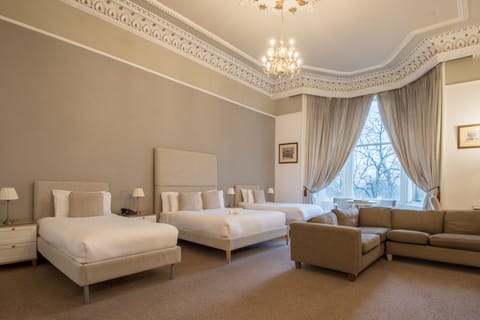 Deluxe Suite | Sleeps 4  | Premium bedding, desk, iron/ironing board, free WiFi
