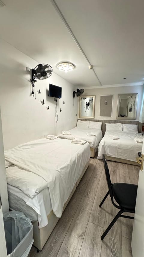 Family Room, 1 Bedroom | Iron/ironing board, free WiFi, bed sheets