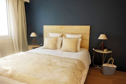 Family Quadruple Room | Pillowtop beds, individually furnished, blackout drapes