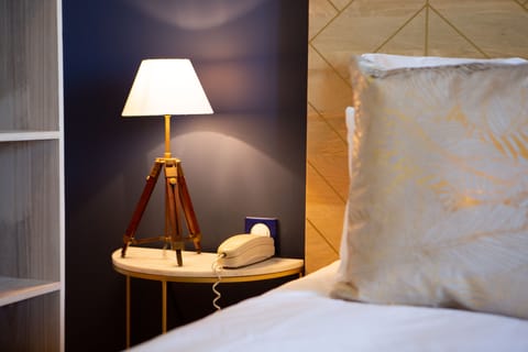 Standard Double Room | Pillowtop beds, individually furnished, blackout drapes