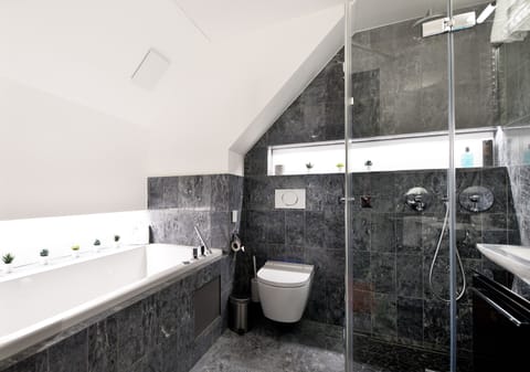 Design Double Room | Bathroom | Separate tub and shower, deep soaking tub, hair dryer, towels