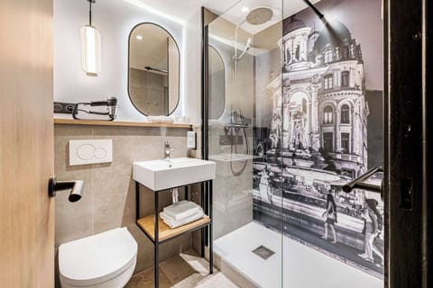 Shower, eco-friendly toiletries, hair dryer, towels