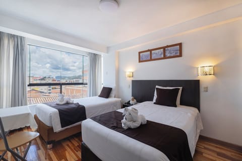 Standard Twin Room, 1 Bedroom | In-room safe, iron/ironing board, free WiFi, bed sheets
