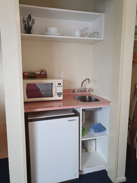 Fridge, microwave, electric kettle, toaster