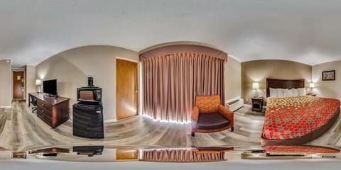 Suite, 1 King Bed, Non Smoking | 1 bedroom, desk, iron/ironing board, free WiFi