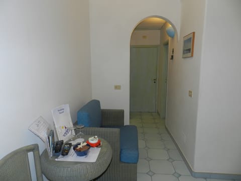 Standard Double Room, Balcony, Sea View | Minibar, in-room safe, individually decorated, desk