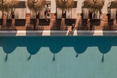 Outdoor pool, open 10 AM to 6 PM, pool umbrellas, sun loungers