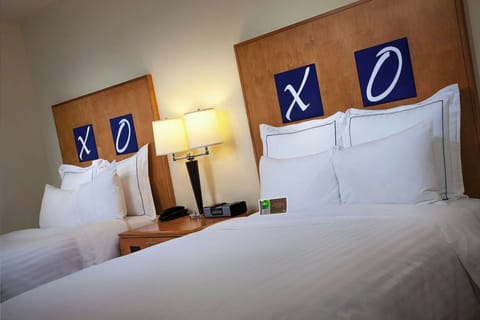 Premium bedding, down comforters, in-room safe, desk