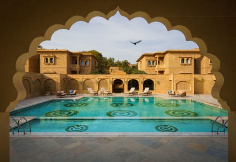 Outdoor pool, open 7:00 AM to 6:00 PM, free cabanas, pool umbrellas
