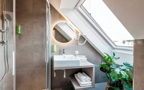 Panoramic Apartment | Bathroom | Shower, hair dryer, towels, soap