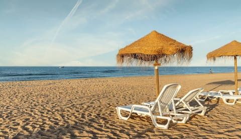 On the beach, white sand