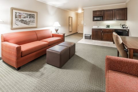 Suite, Multiple Beds, Non Smoking | Living area | 43-inch flat-screen TV with cable channels, TV