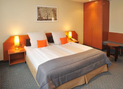 Standard Double or Twin Room | Minibar, desk, iron/ironing board, free cribs/infant beds