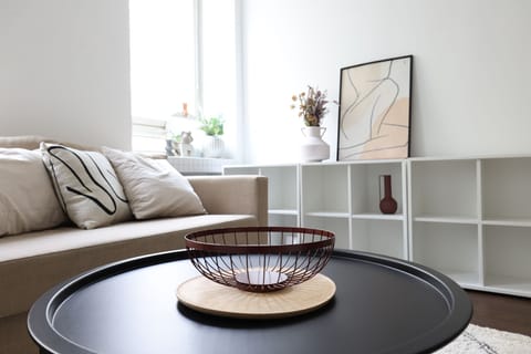 City Apartment | Living area | 36-inch TV with cable channels