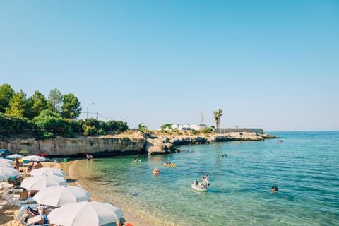 Private beach, sun loungers, beach umbrellas, water skiing