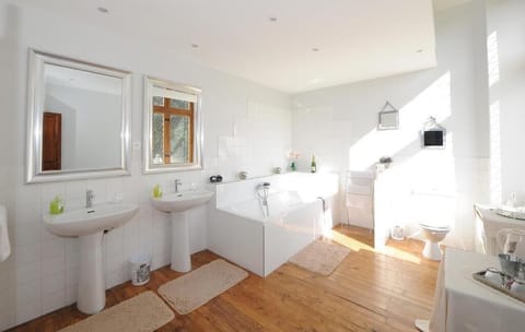 Bathtub, free toiletries, hair dryer, bathrobes