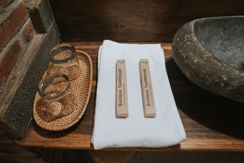 Triple Room, Garden View (Joglo) | Bathroom | Shower, rainfall showerhead, free toiletries, bidet