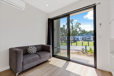 Villa | Living area | 50-inch Smart TV with digital channels, TV