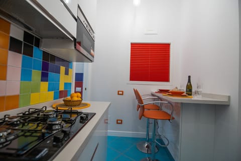 Deluxe Condo | Private kitchen | Fridge, microwave, oven, stovetop