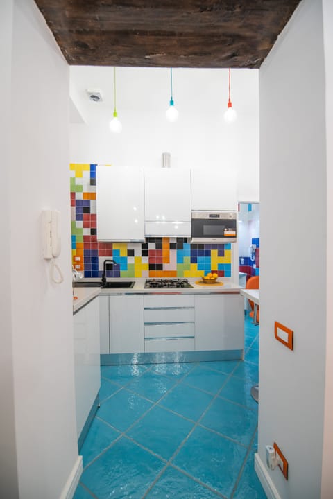 Deluxe Condo | Private kitchen | Fridge, microwave, oven, stovetop