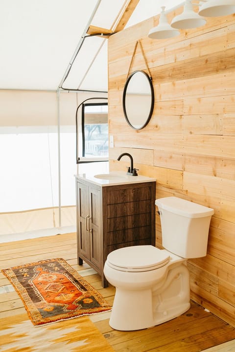 Tent, 1 King Bed, Pool Access, Garden View | Bathroom | Shower, towels, soap, shampoo