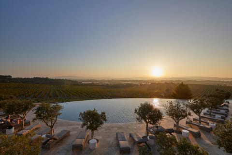 Indoor pool, seasonal outdoor pool, pool umbrellas, sun loungers