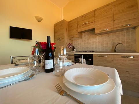 Family Condo | Private kitchen | Stovetop, cookware/dishes/utensils