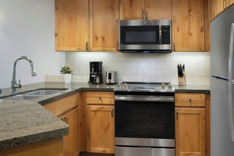 Microwave, coffee/tea maker, cookware/dishes/utensils