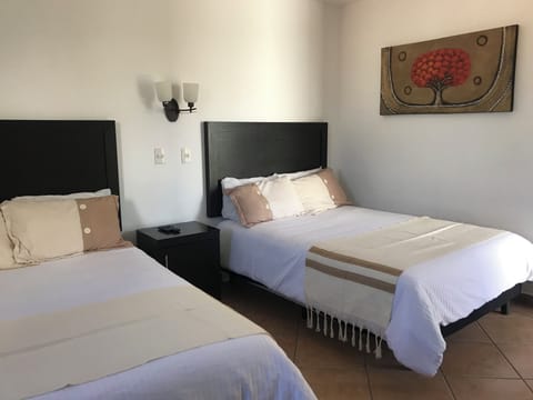 Suite | Pillowtop beds, in-room safe, iron/ironing board, cribs/infant beds