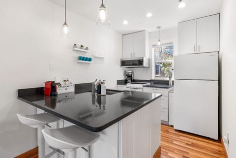Condo, 1 Bedroom | Private kitchen | Fridge, oven, stovetop, coffee/tea maker