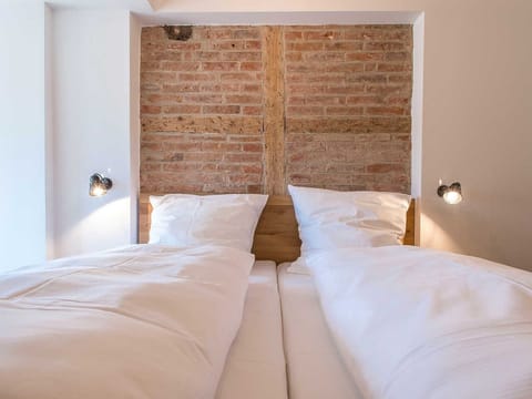 Deluxe Duplex, 1 Bedroom | In-room safe, individually decorated, travel crib, free WiFi