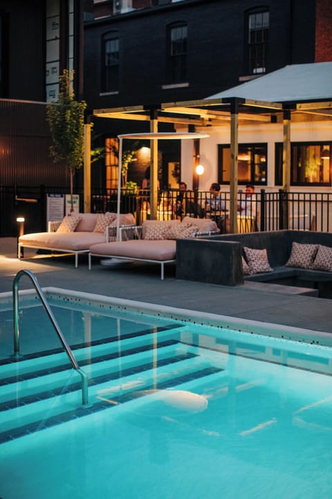 Outdoor pool, open 9:00 AM to 10:00 PM, free cabanas, pool umbrellas