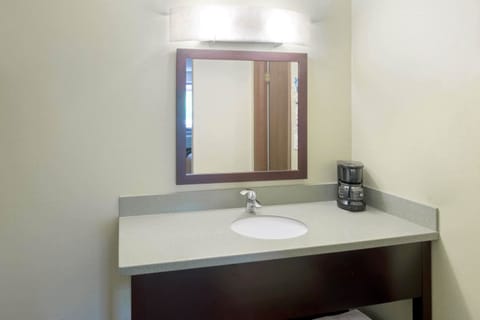 Desk, blackout drapes, iron/ironing board, free cribs/infant beds