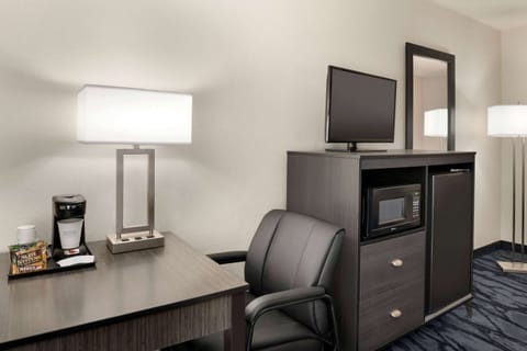 Desk, blackout drapes, iron/ironing board, free cribs/infant beds