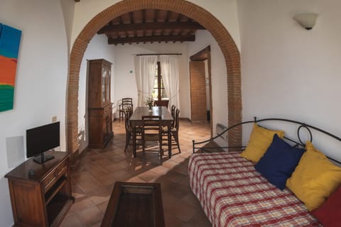 Family Apartment, 2 Bedrooms | Living area | 32-inch flat-screen TV with digital channels, TV